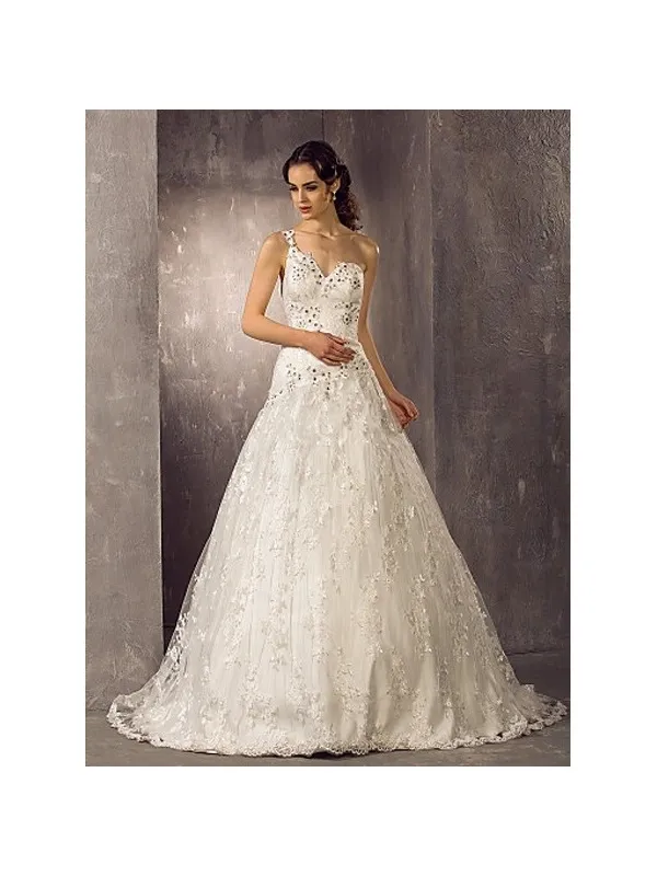 Abito da sposa in pizzo particolare con dettagli neri