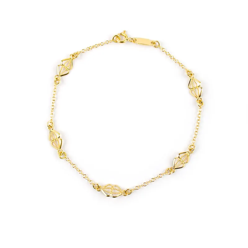 Bracciale in oro giallo con filigrana a rombo