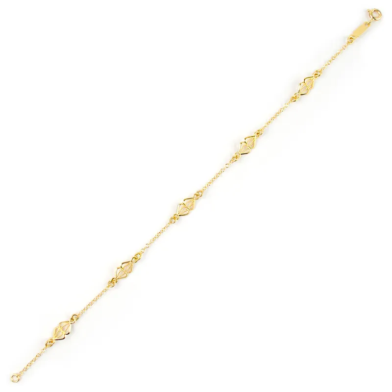 Bracciale in oro giallo con filigrana a rombo