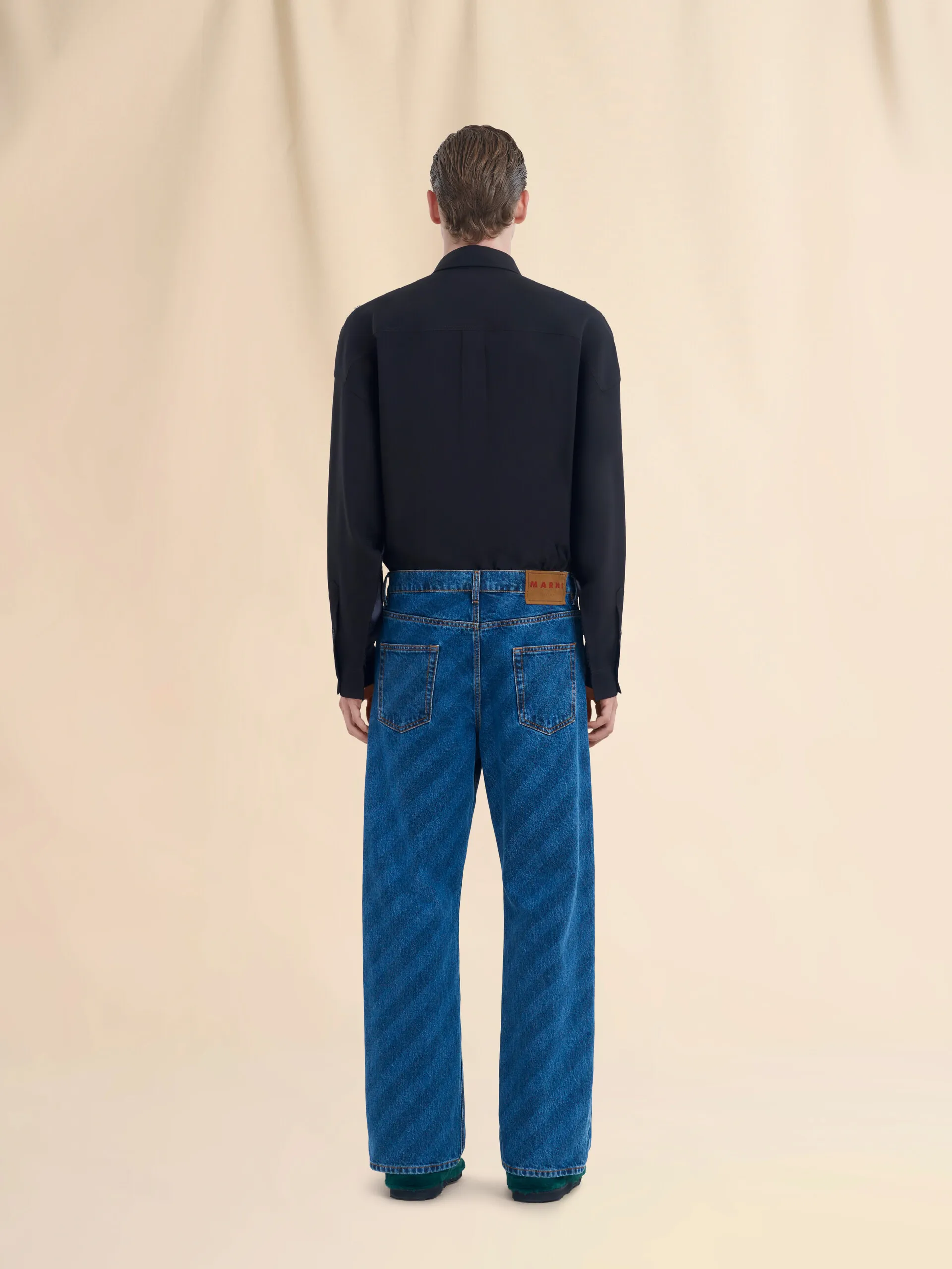 Jeans con gamba ampia in denim blu a righe