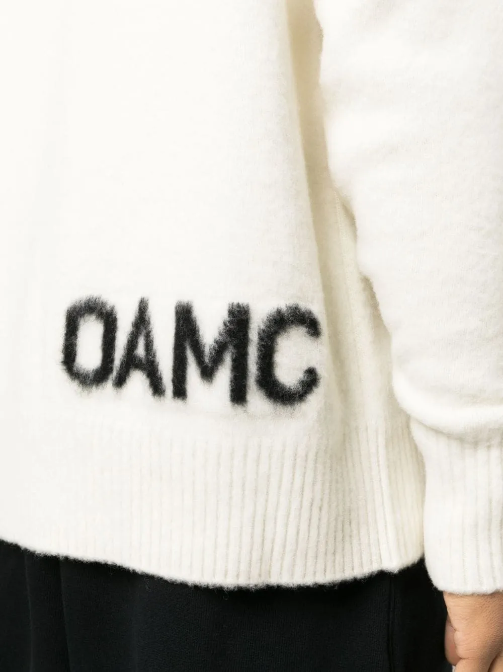 maglione bianco con logo
