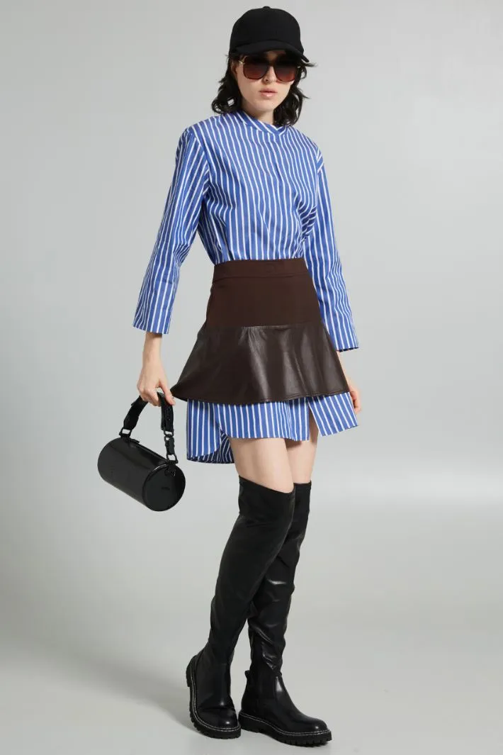 Minigonna in pelle e jersey