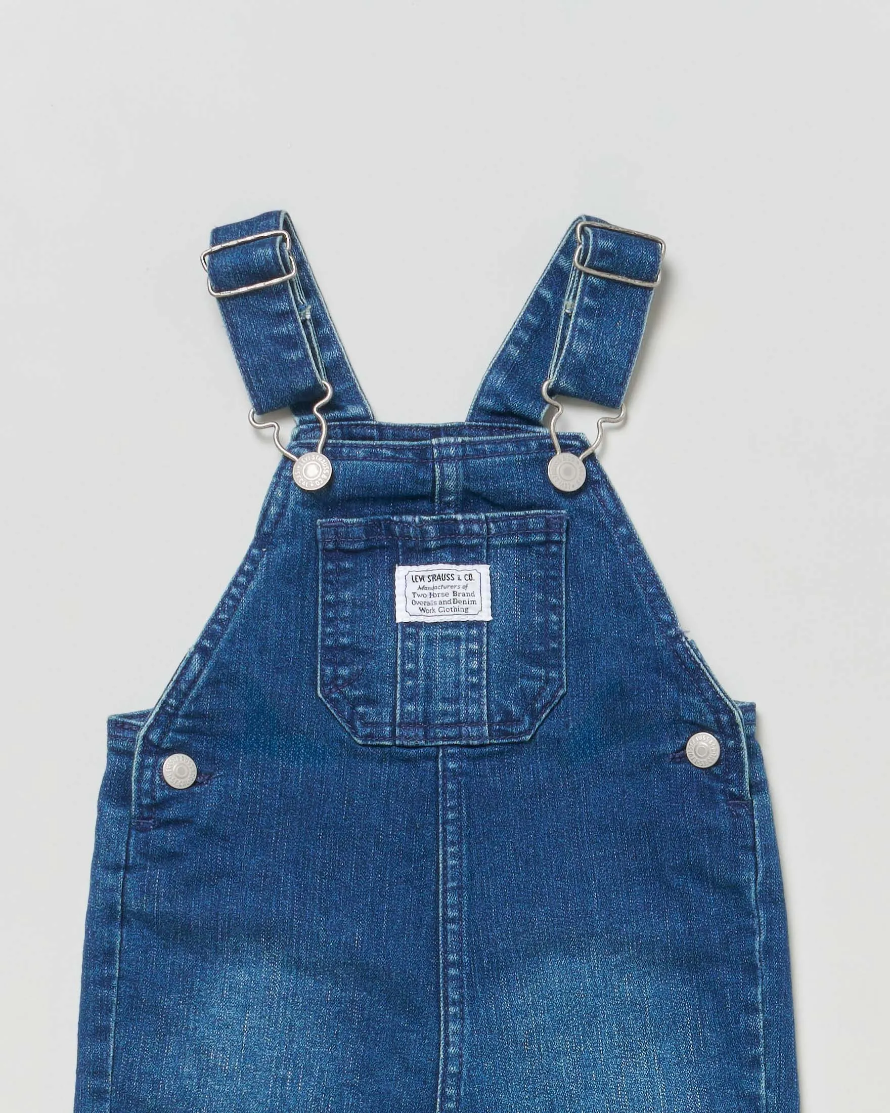 Salopette in denim di cotone a lavaggio medio stone washed 6-24 mesi