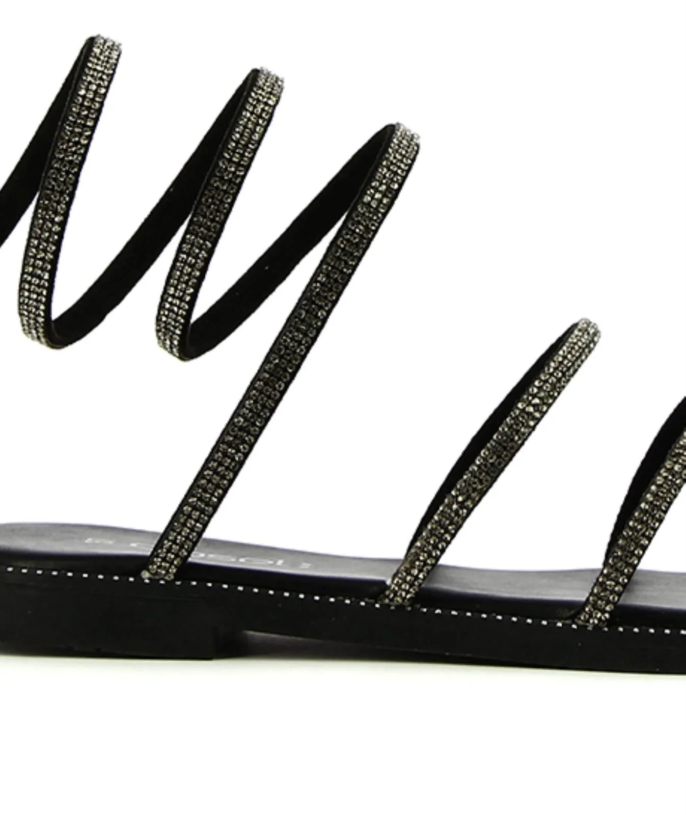 Sandali neri bassi con cinturino a spirale con strass