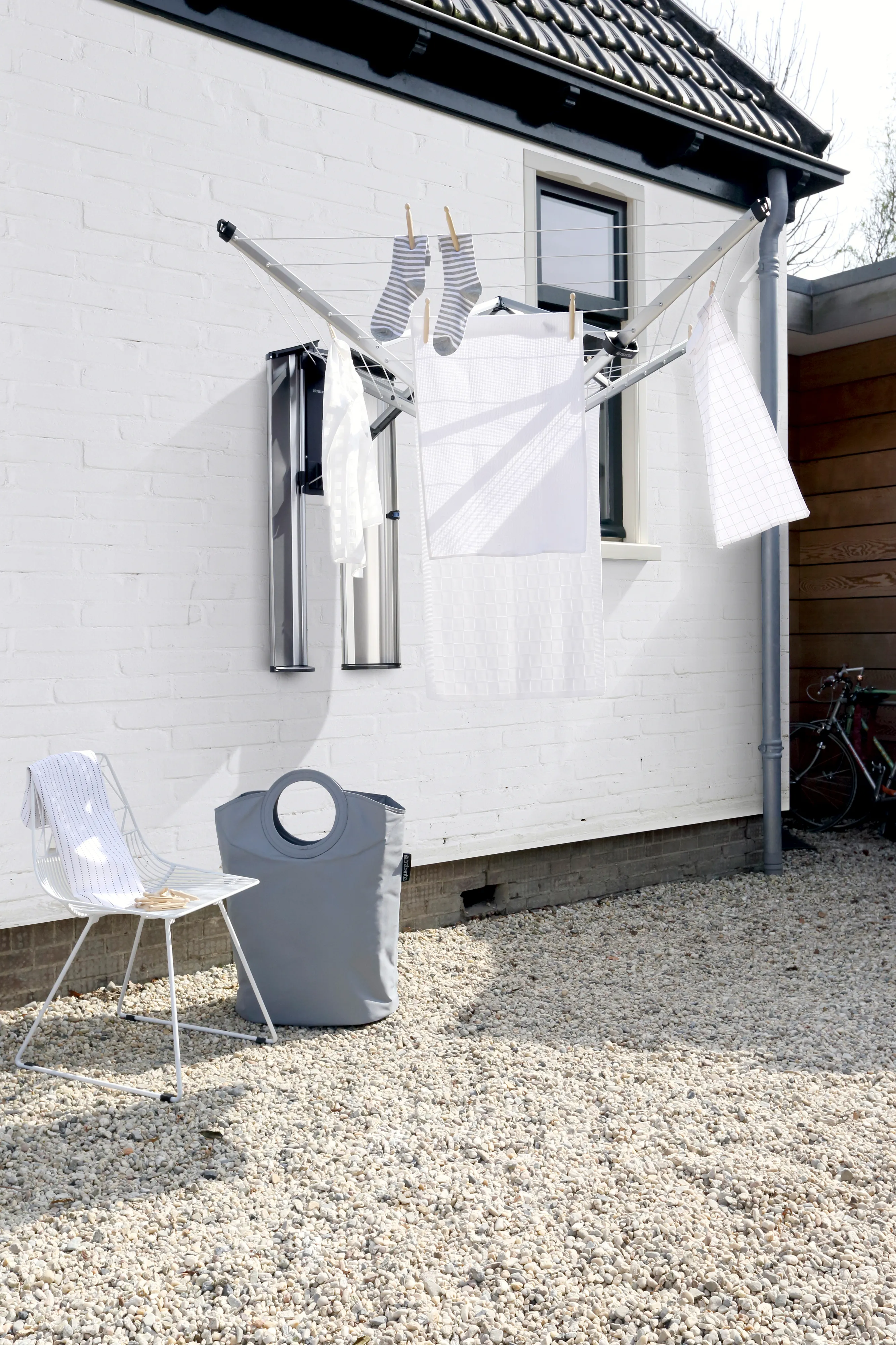 Stendibiancheria 24 m WallFix con copertura in tessuto.k2{font-size:18px}Grigio