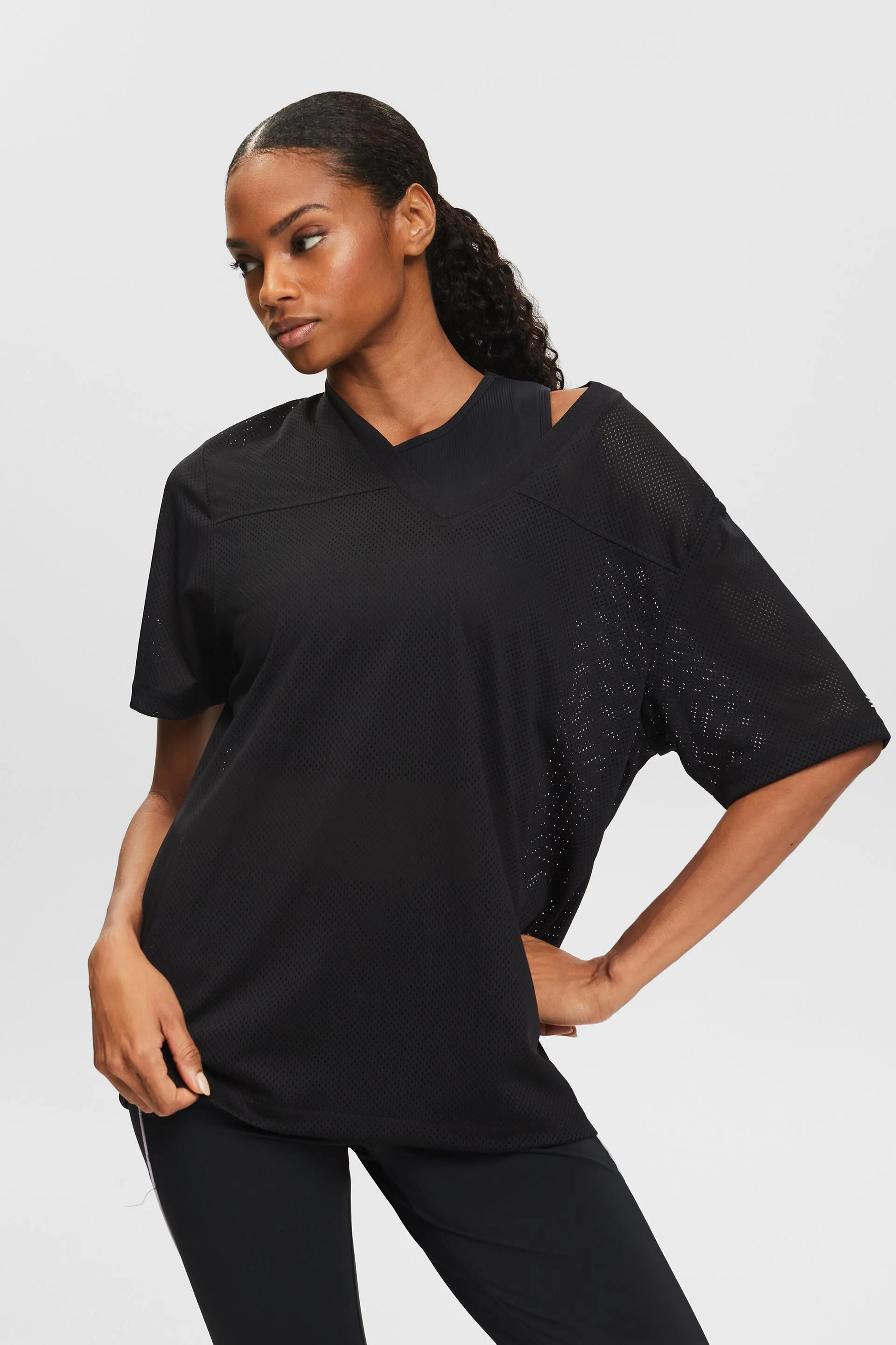 T-shirt con scollo a V in maglia aperta