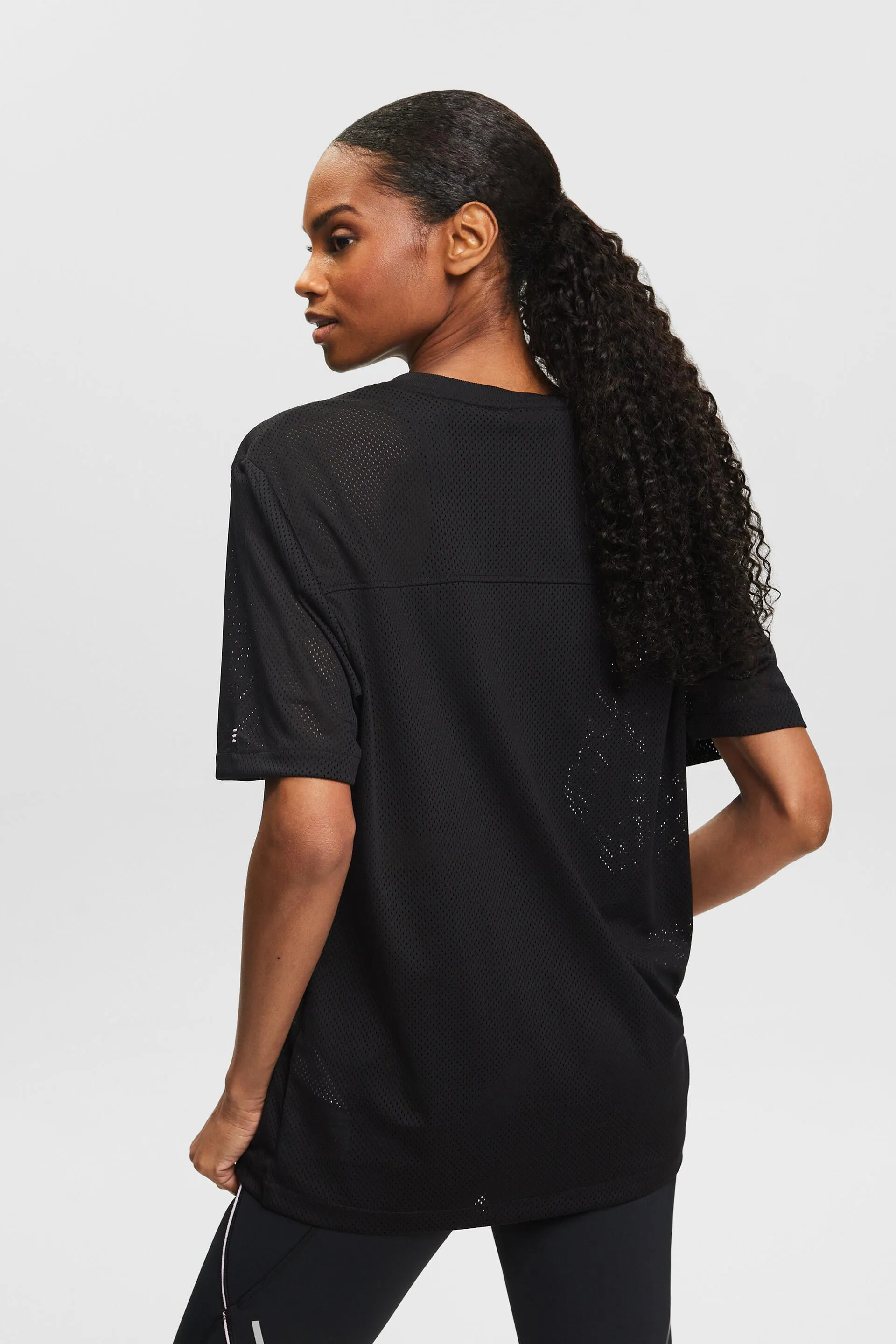 T-shirt con scollo a V in maglia aperta