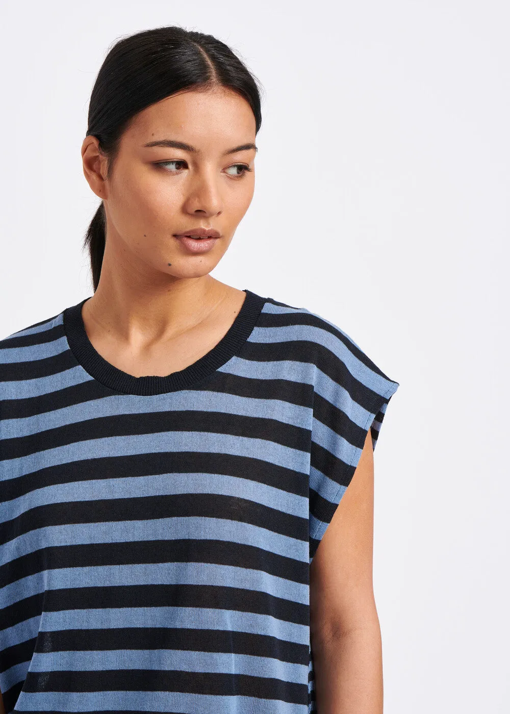 Thin sleeveless sweater with blue stripes
